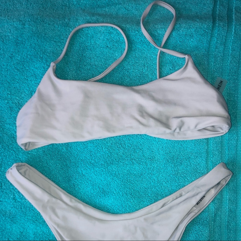 never worn top and bottom, high cut bottoms, very cheeky
